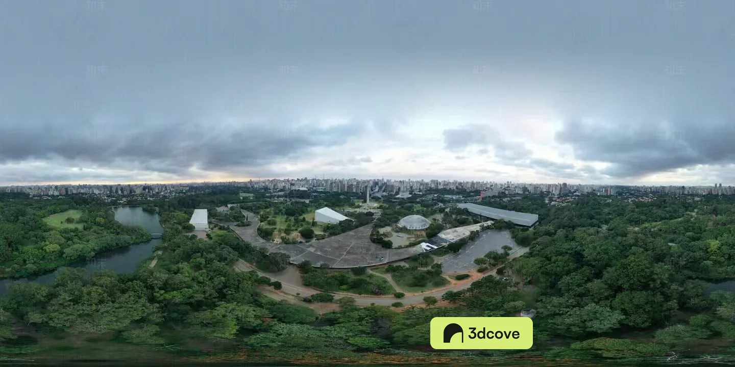 The Main Subject Is A Large Building Complex In A Park