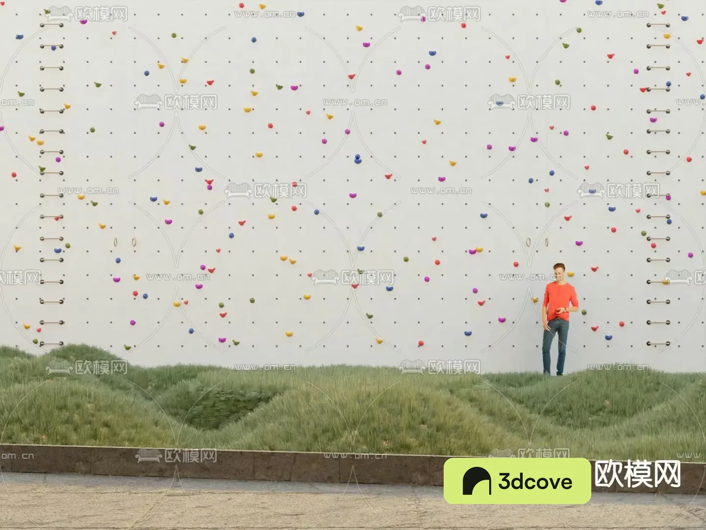 A Man Standing In Front Of A Climbing Wall