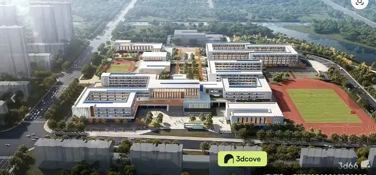 Aerial View Of A Large Building Complex With A Track And Field