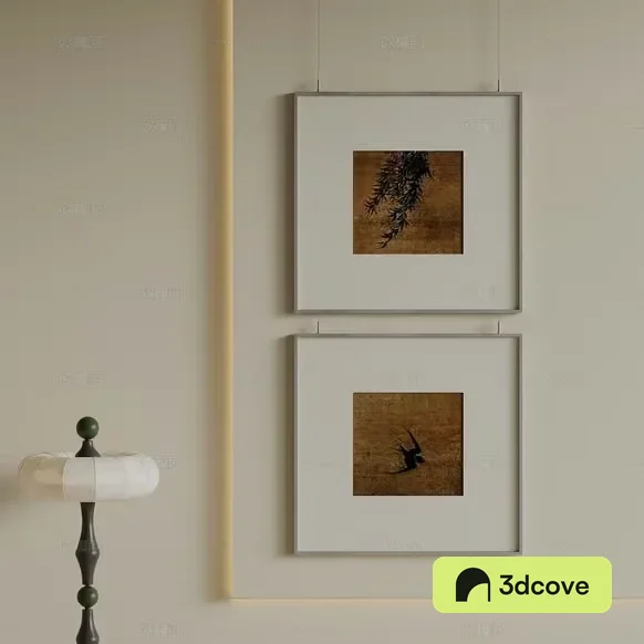 A Wall With Two Framed Pictures